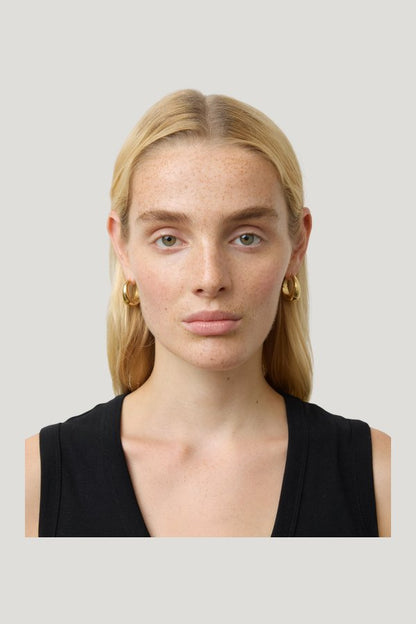 The Andrea Earrings — model side