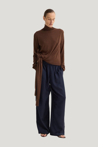 Wide leg silk trousers | night — model front