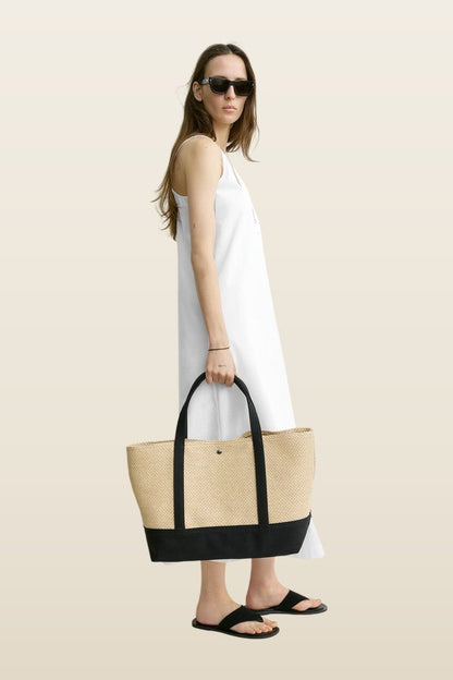 Woven beach tote — model back
