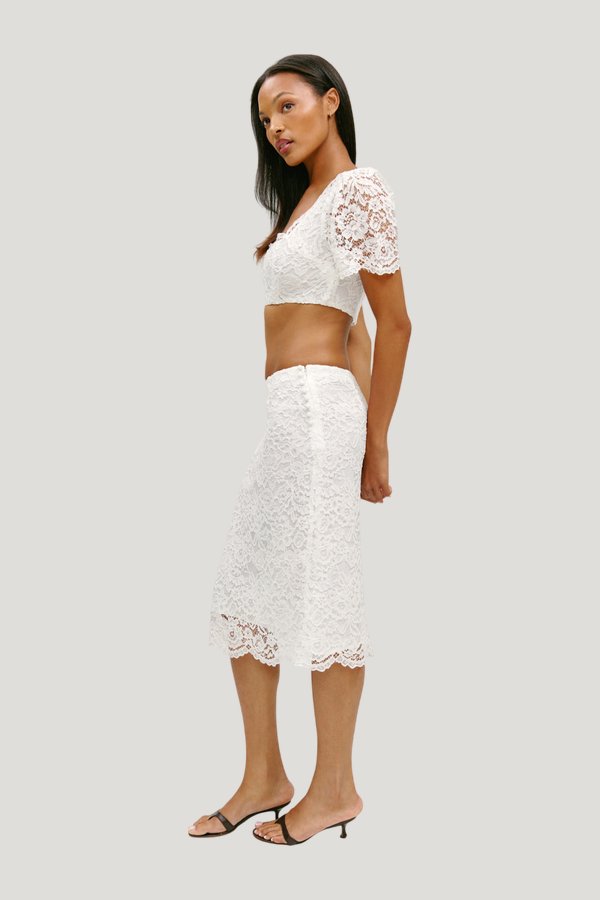 x Paige Lorenze Honeymoon Lace Midi Skirt - Sunday Ceremony — model side